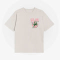Beige t-shirt with graphic design and text on a white background